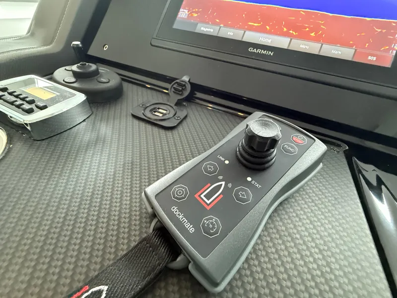 Slide: The Image of Control panel of 2018 Cruisers Yachts 42 Cantius with Garmin display and Dockmate joystick. - 39