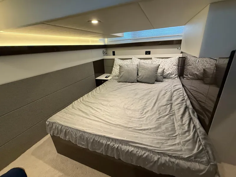 Slide: The Image of Luxurious bedroom interior of 2018 Cruisers Yachts 42 Cantius with modern design and cozy bedding. - 47