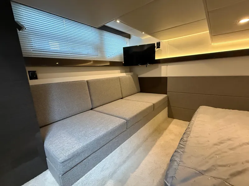 Slide: The Image of Interior of 2018 Cruisers Yachts 42 Cantius with modern seating and TV. - 46