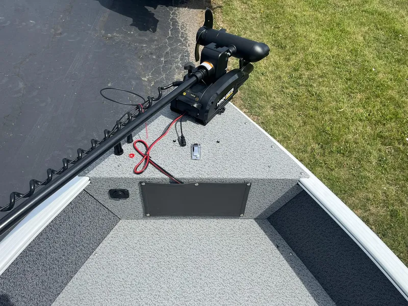 Slide: The Image of 2026 Lund 1675 Adventure Sport boat with trolling motor on deck. - 15