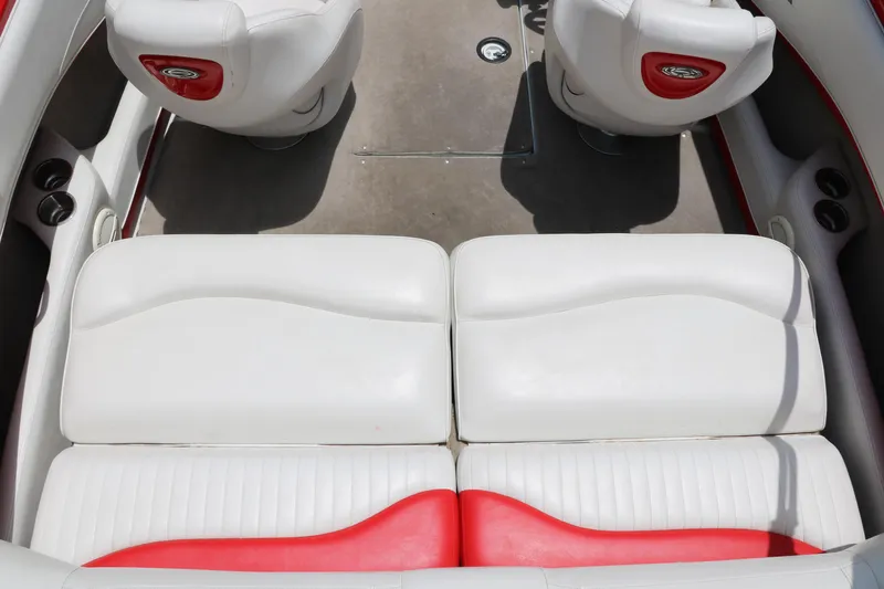 Slide: The Image of 2006 Crownline 21 SS-LPX boat interior with white and red seating. - 13