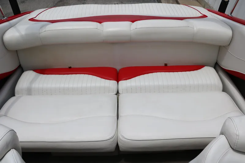 Slide: The Image of 2006 Crownline 21 SS-LPX boat interior with white and red seating. - 14