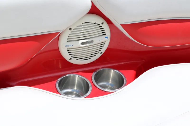 Slide: The Image of 2006 Crownline 21 SS-LPX boat interior with speaker and cup holders. - 17