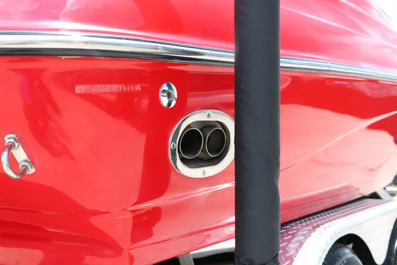 Slide: The Image of Red 2006 Crownline 21 SS-LPX boat with dual exhaust detail. - 26