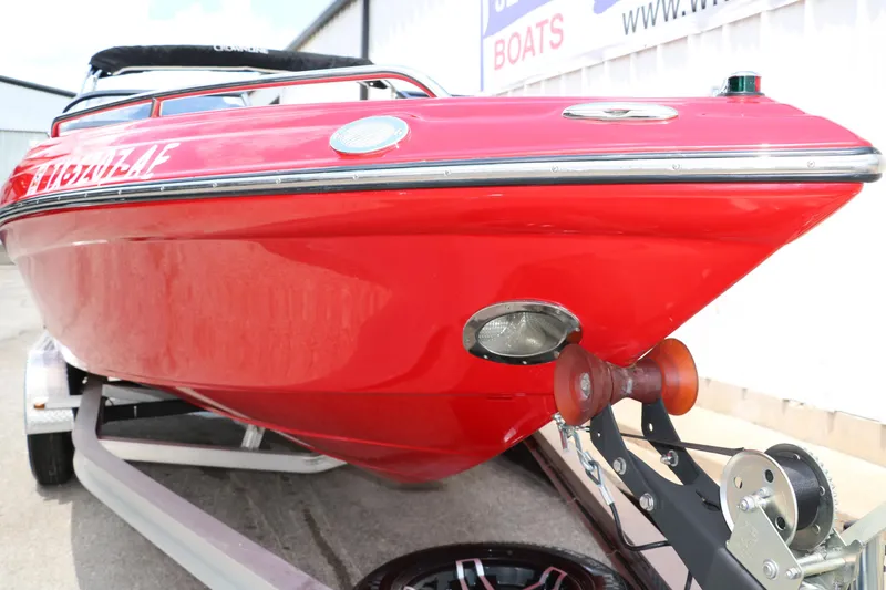 Slide: The Image of Red 2006 Crownline 21 SS-LPX boat on trailer, close-up of bow and trailer winch. - 9