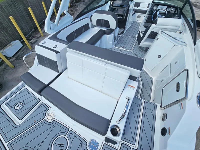 Slide: The Image of 2025 Monterey M-45 boat interior with sleek seating and modern design. - 11