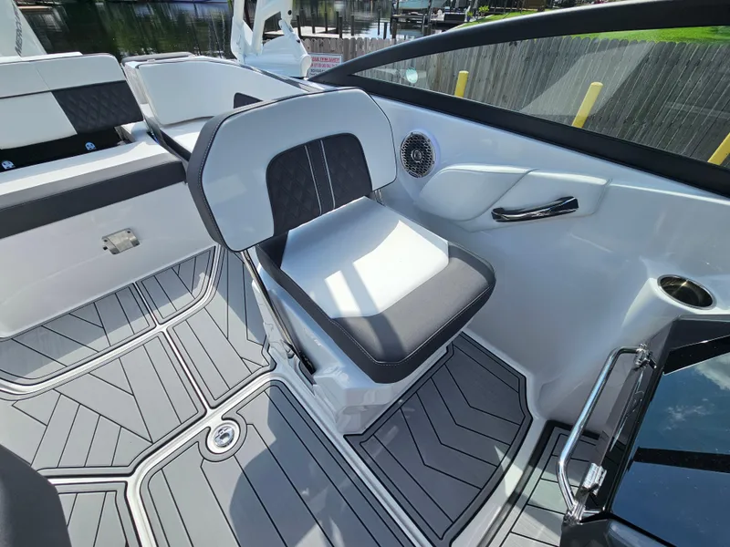 Slide: The Image of 2025 Monterey M-45 boat interior with sleek seating and modern design. - 18