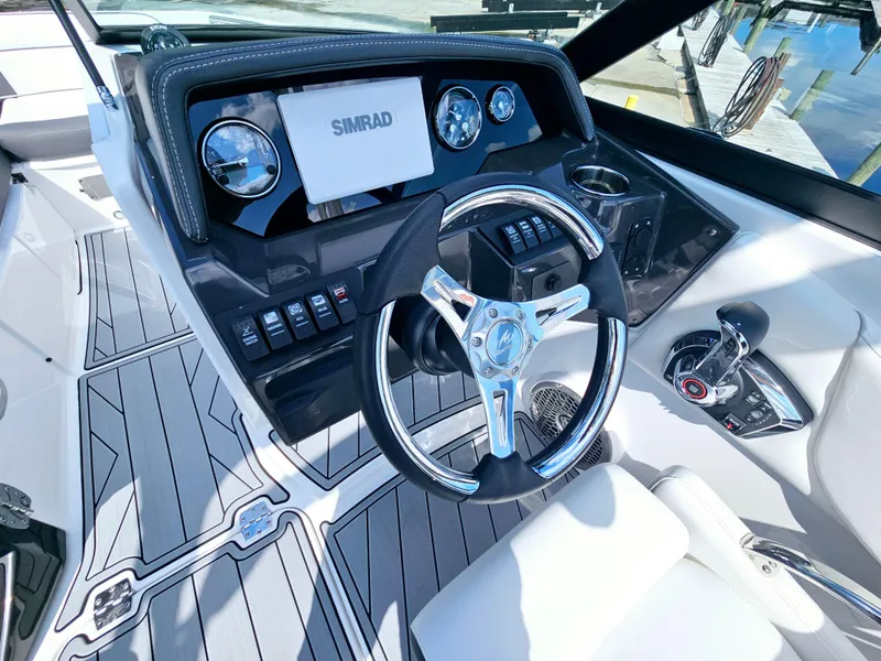 Slide: The Image of Cockpit of 2025 Monterey M-45 boat with modern steering and navigation system. - 20