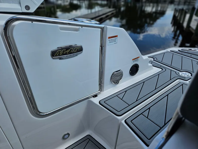 Slide: The Image of 2025 Monterey M-45 boat deck with sleek design and modern features. - 13
