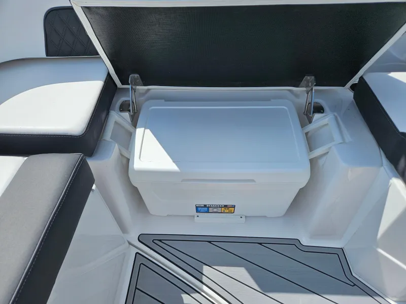 Slide: The Image of 2025 Monterey M-45 boat interior with storage compartment and seating. - 17