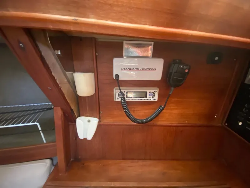 Slide: The Image of 1986 S2 11 Center Cockpit interior with Standard Horizon radio equipment. - 33