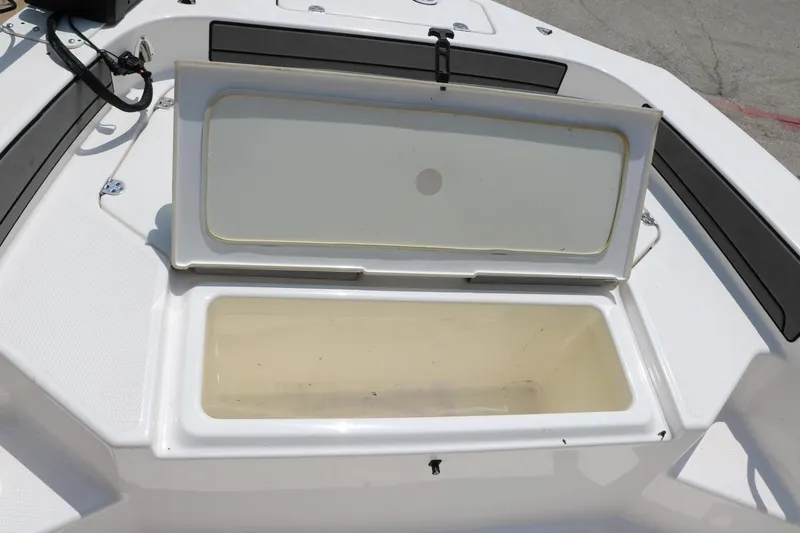 Slide: The Image of Open storage compartment on 2018 Yamaha Boats 190 FSH Sport. - 18