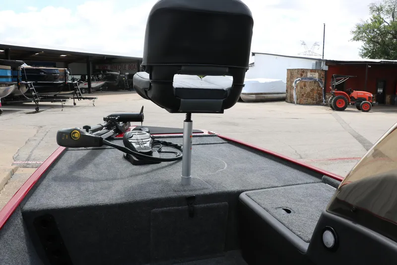 Slide: The Image of 2023 Bass Tracker Classix XL boat interior with seat and control panel. - 15