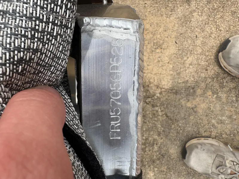 Slide: The Image of Close-up of Trifecta CS 22UL 3.0 2025 model with engraved serial number. - 14