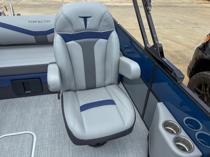 Slide: The Image of 2025 Trifecta CS 22UL 3.0 boat seat with cup holders and sleek design. - 5