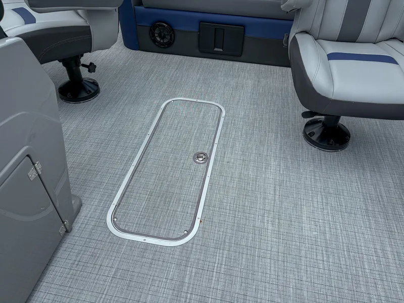 Slide: The Image of 2025 Trifecta CS 22UL 3.0 boat interior with gray flooring and seating. - 6