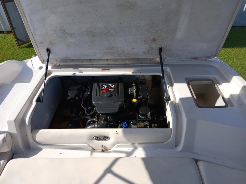 Slide: The Image of Open engine compartment of 2008 Tahoe Q7i boat, showcasing MerCruiser 4.3L MPI engine. - 17