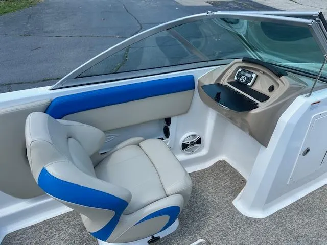 Slide: The Image of 2018 Chaparral 19 H2O Ski & Fish boat interior with blue and beige seating. - 17