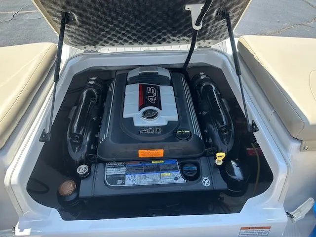 Slide: The Image of Engine compartment of 2018 Chaparral 19 H2O Ski & Fish boat. - 21