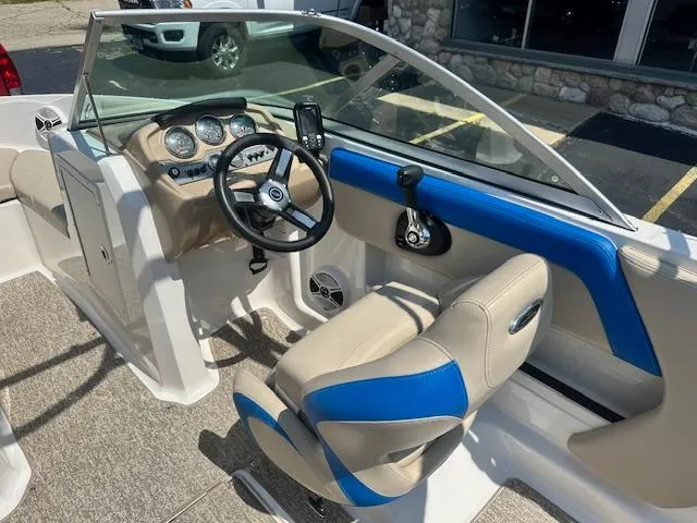 Slide: The Image of 2018 Chaparral 19 H2O Ski & Fish boat interior with steering wheel and dashboard. - 6