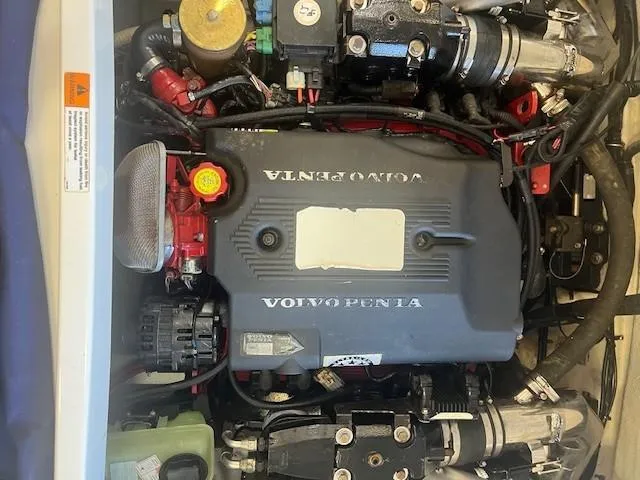 Slide: The Image of Engine compartment of a 2004 Chris-Craft Corsair 25 with Volvo Penta engine. - 21