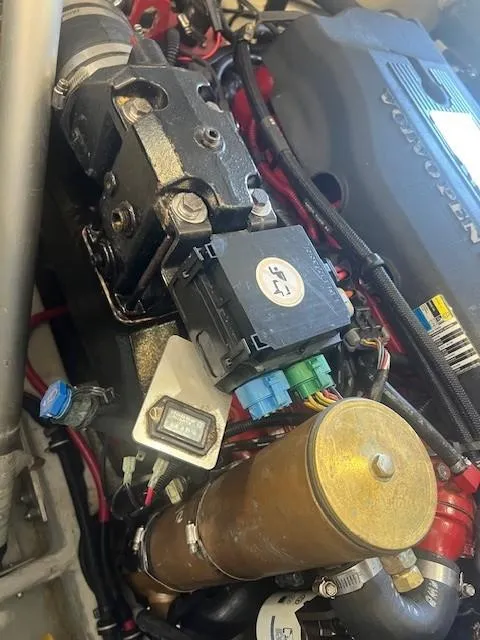 Slide: The Image of Engine components of a 2004 Chris-Craft Corsair 25 boat, featuring detailed mechanical parts. - 24