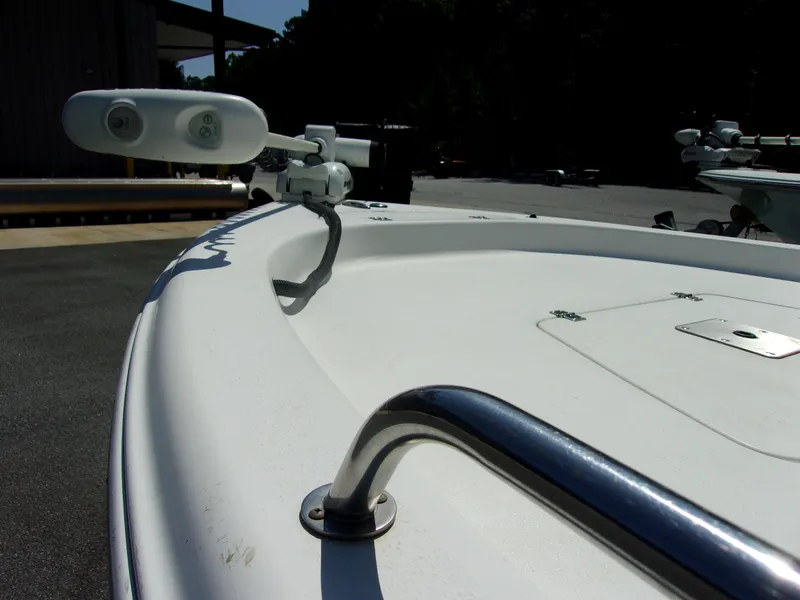 Slide: The Image of 2011 Tidewater 2100 Bay Max boat deck with railing and mounted equipment. - 10