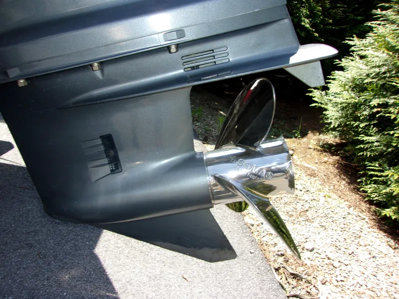 Slide: The Image of Close-up of a 2011 Tidewater 2100 Bay Max boat propeller in sunlight. - 4
