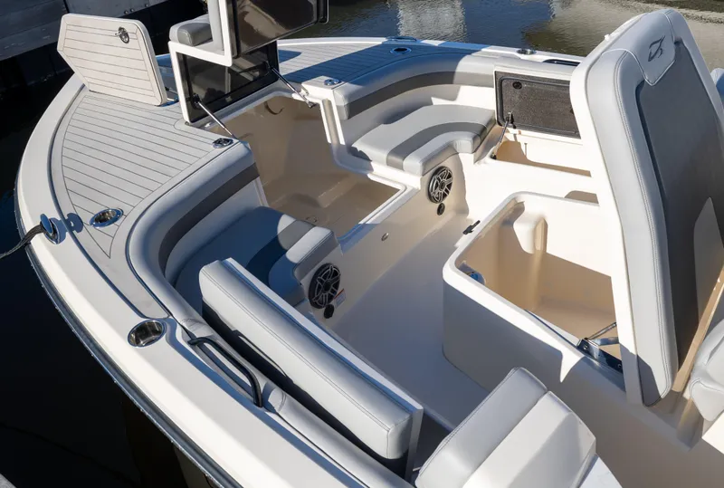 Slide: The Image of 2026 Scout 281 X Signature Edition boat interior with seating and storage compartments. - 6