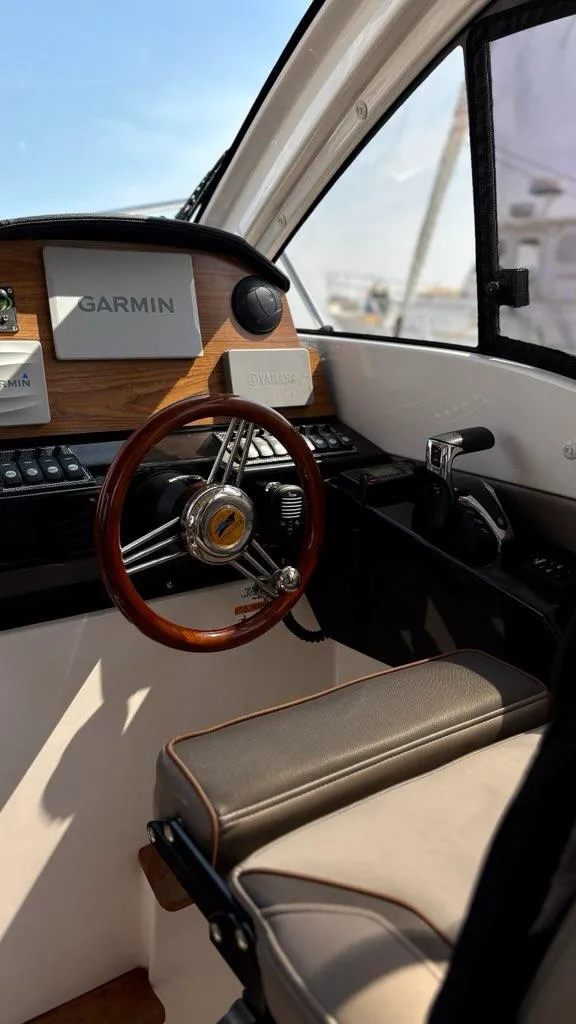 Slide: The Image of Interior of 2022 Cutwater C-248 Coupe boat with Garmin navigation system and leather seating. - 19