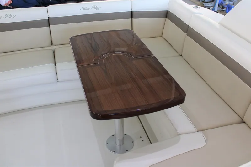 Slide: The Image of Luxurious seating area on 2012 Sea Ray 450 Sundancer yacht with elegant wooden table. - 22