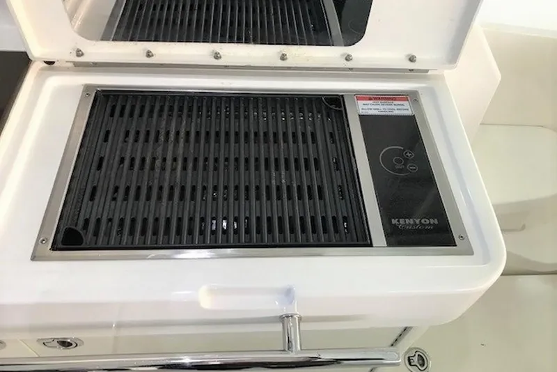 Slide: The Image of Kenyon electric grill on 2012 Sea Ray 450 Sundancer yacht. - 27