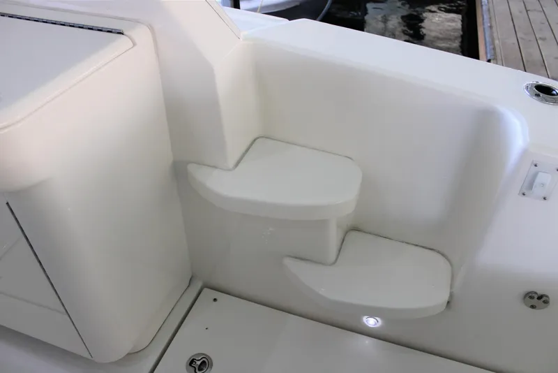 Slide: The Image of Steps on a 2012 Sea Ray 450 Sundancer yacht, featuring sleek white design. - 30