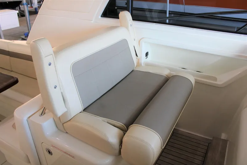 Slide: The Image of Luxury seating on 2012 Sea Ray 450 Sundancer yacht, featuring beige and gray upholstery. - 40
