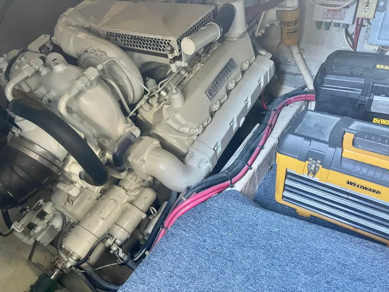 Slide: The Image of Engine room of a 1988 Californian express cruiser with Caterpillar engine and toolboxes. - 21