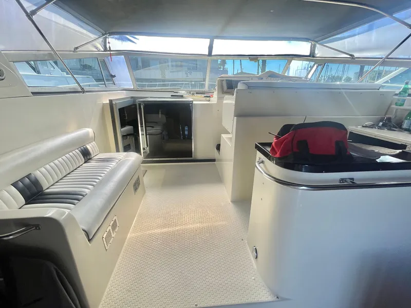 Slide: The Image of 1988 Californian express cruiser interior with seating and helm, showcasing modern design. - 23