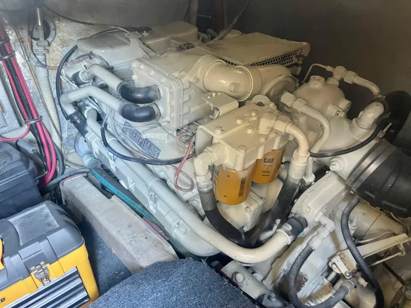 Slide: The Image of 1988 Californian express cruiser engine compartment with Caterpillar marine engine. - 25
