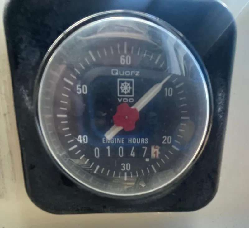 Slide: The Image of 1988 Californian express cruiser engine hour meter showing 1047 hours. - 29