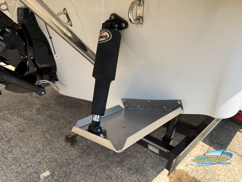 Slide: The Image of 2006 Crownline 260 EX boat with trim tab and hydraulic actuator detail. - 28