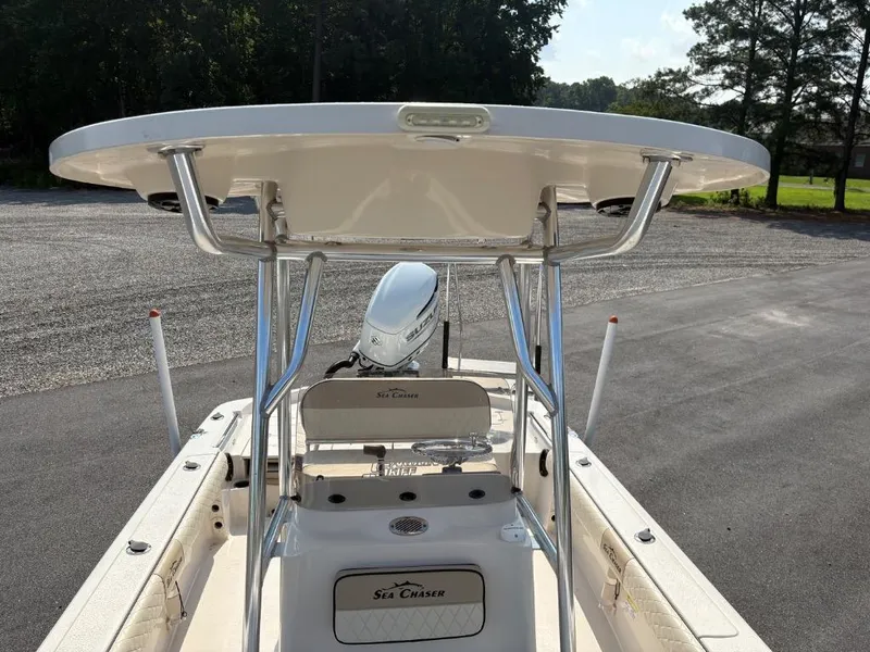 Slide: The Image of 2021 Sea Chaser 23 LX boat with T-top and Suzuki outboard motor. - 17