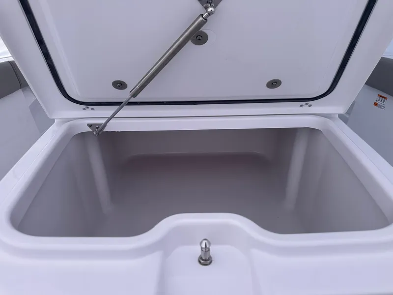 Slide: The Image of Open storage compartment on 2025 Sportsman Masters 247OE Bay Boat. - 33