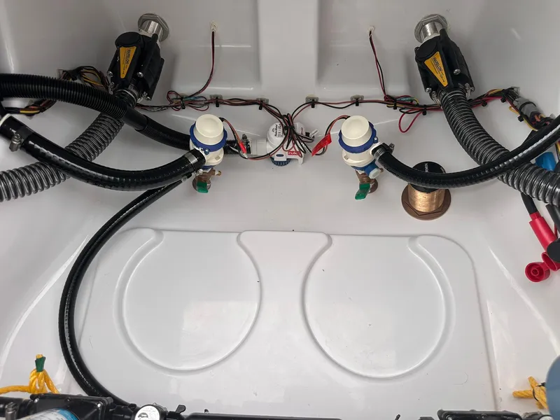 Slide: The Image of 2025 Sportsman Masters 247OE Bay Boat wiring and plumbing components. - 43