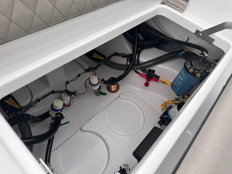 Slide: The Image of 2025 Sportsman Masters 247OE Bay Boat interior wiring and components view. - 46