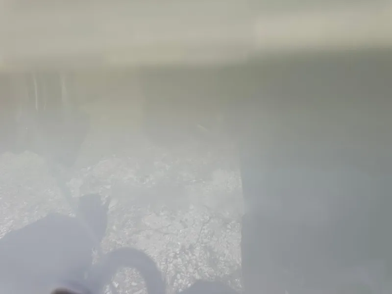 Slide: The Image of Blurry image of a 2025 Sportsman Masters 247OE Bay Boat hull. - 48