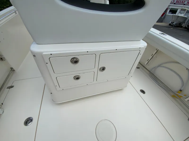 Slide: The Image of 2023 Cobia 240 Center Console boat interior storage compartments. - 19