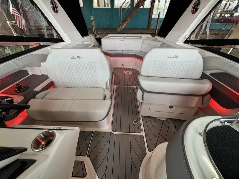Slide: The Image of Interior of 2026 Sea Ray SLX 310 yacht with luxurious seating. - 20