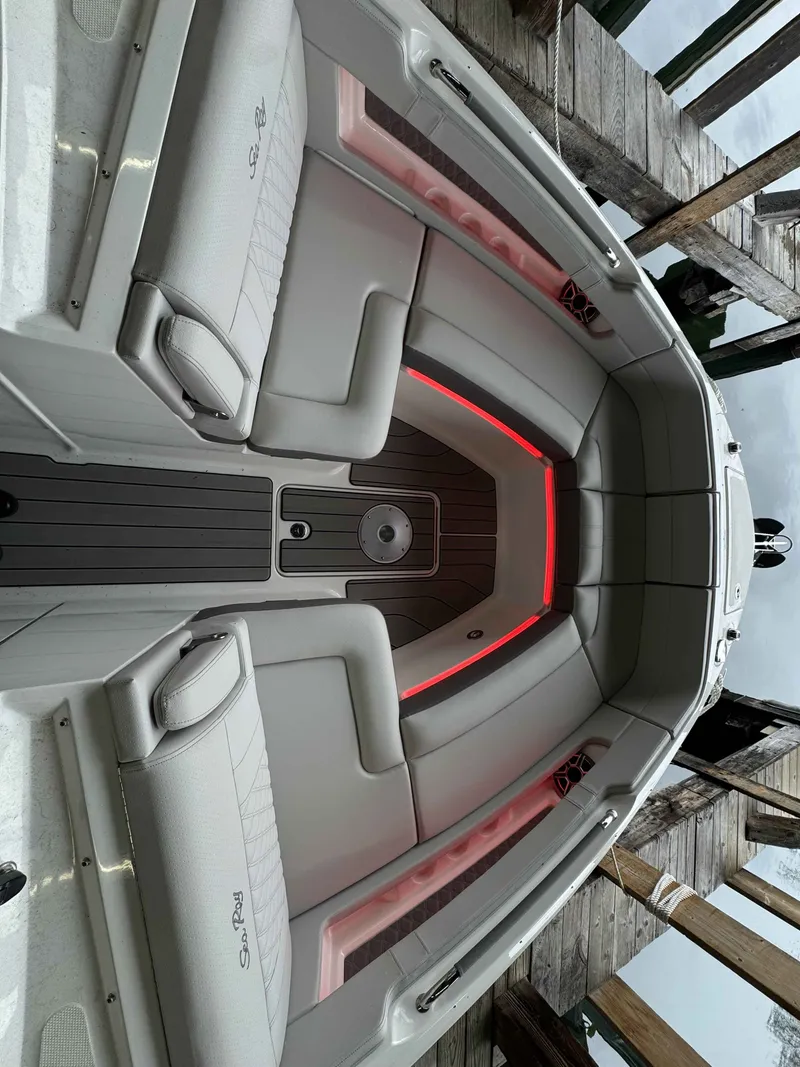 Slide: The Image of Interior of 2026 Sea Ray SLX 310 yacht with luxurious seating. - 21