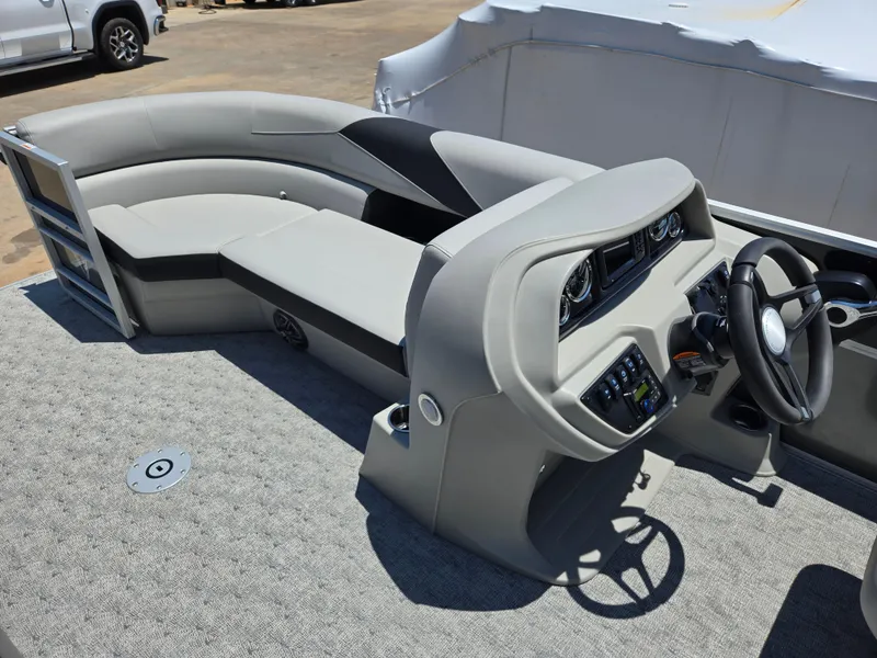 Slide: The Image of 2025 Trifecta 24 UL LET2.75 boat interior with modern helm and seating. - 10