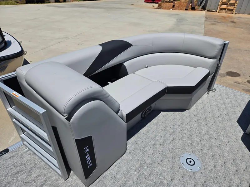 Slide: The Image of 2025 Trifecta 24 UL LET2.75 pontoon boat with sleek gray seating and modern design. - 11