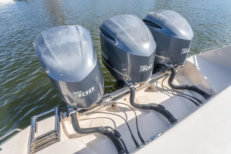 Slide: The Image of Triple Yamaha 300 engines on a 2017 Grady-White 336 Canyon boat. - 20
